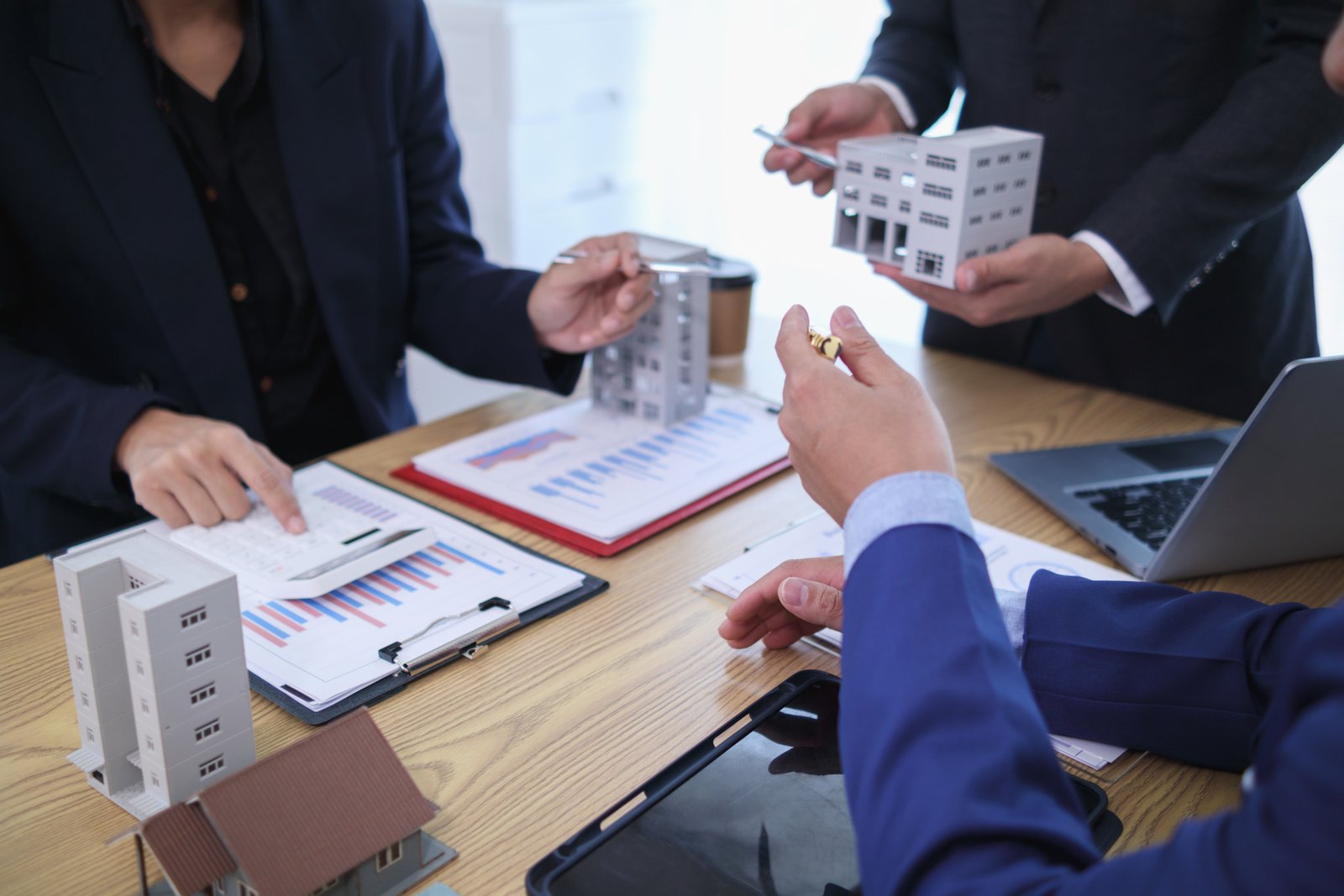 Realtor assisting a family relocating to a new city with a home search
