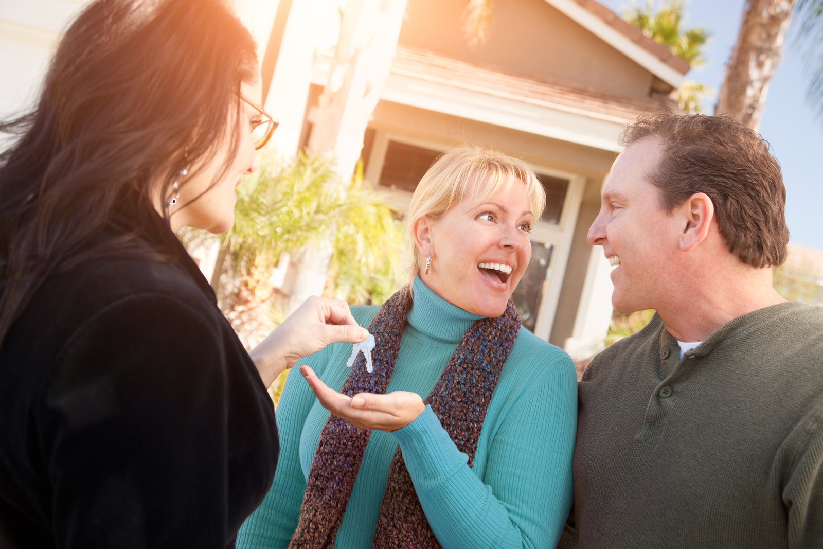 First-time home buyers meeting with a Canadian realtor