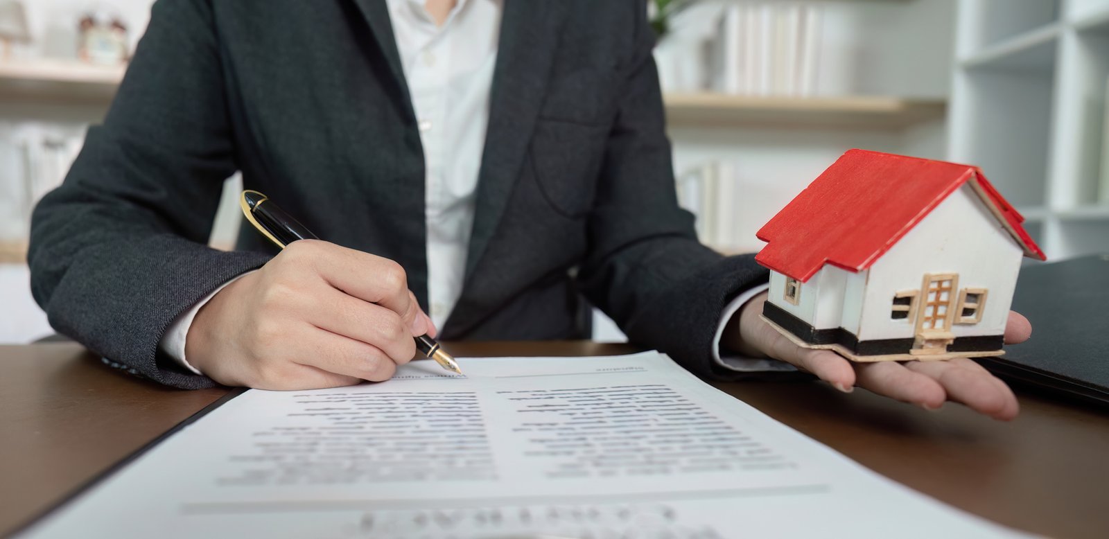 Realtor explaining mortgage pre-approval process to first-time buyers