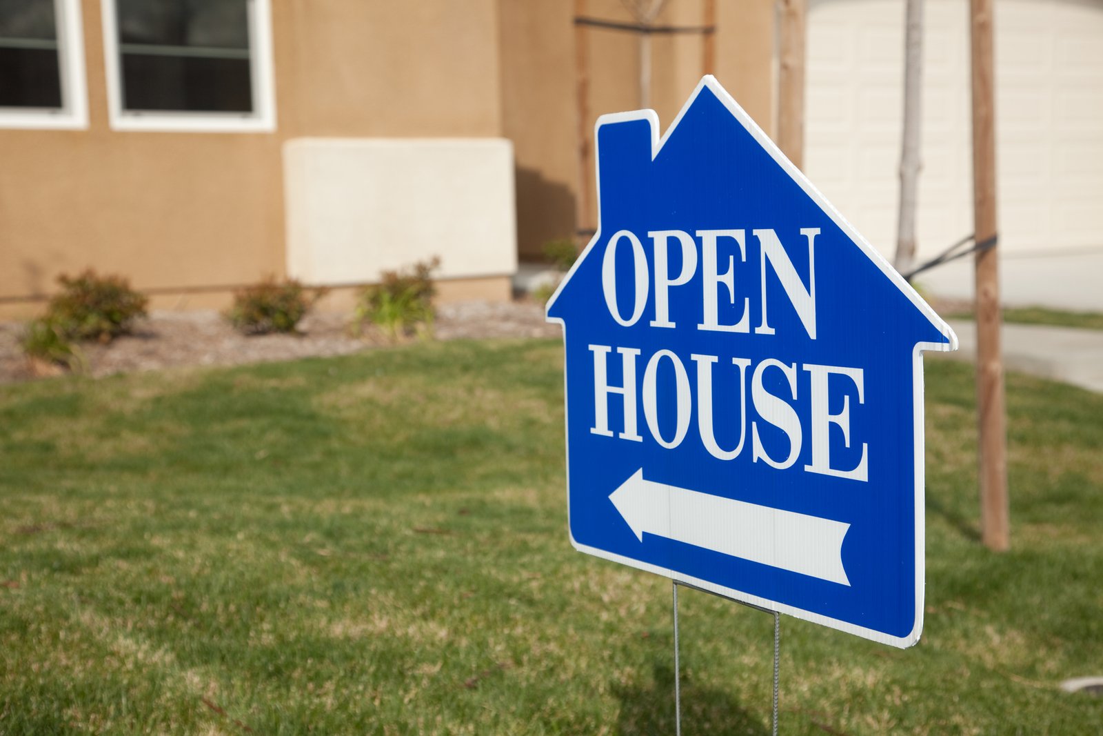 Real estate open house event with prospective buyers viewing property