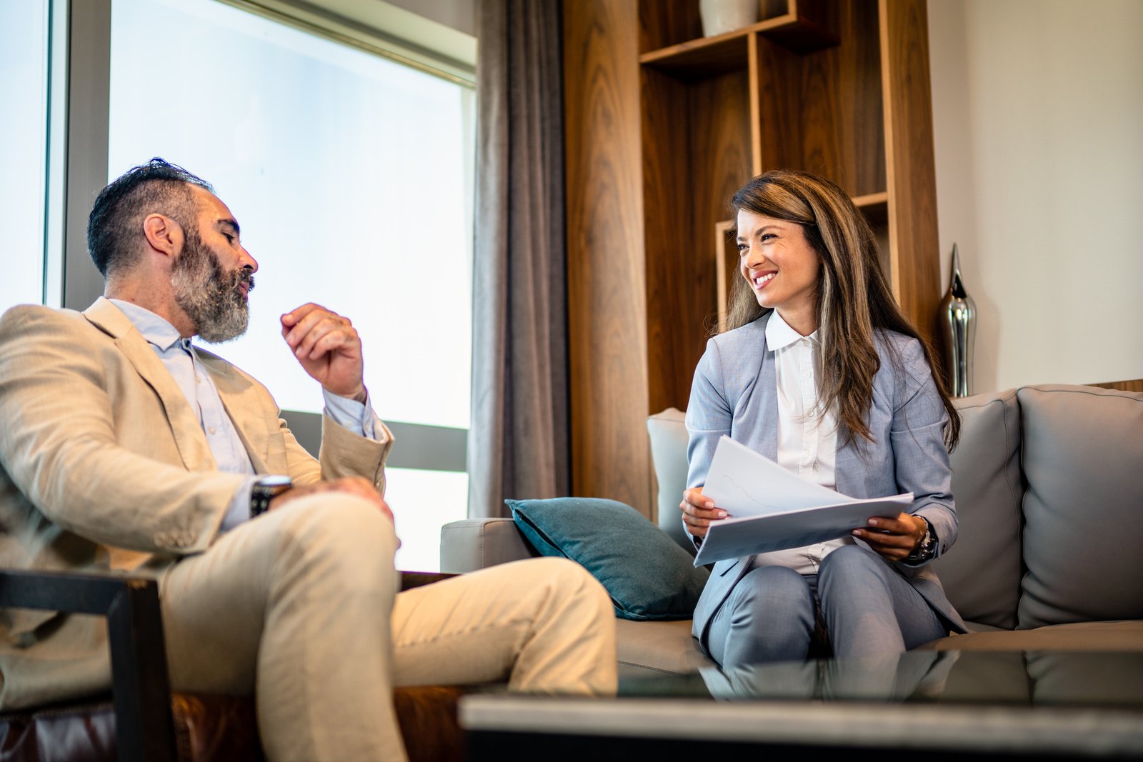 Realtor having an engaged and personalised conversation with clients of different communication styles