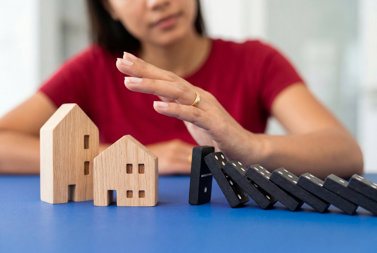 Realtor carefully managing a real estate transaction involving divorcing homeowners